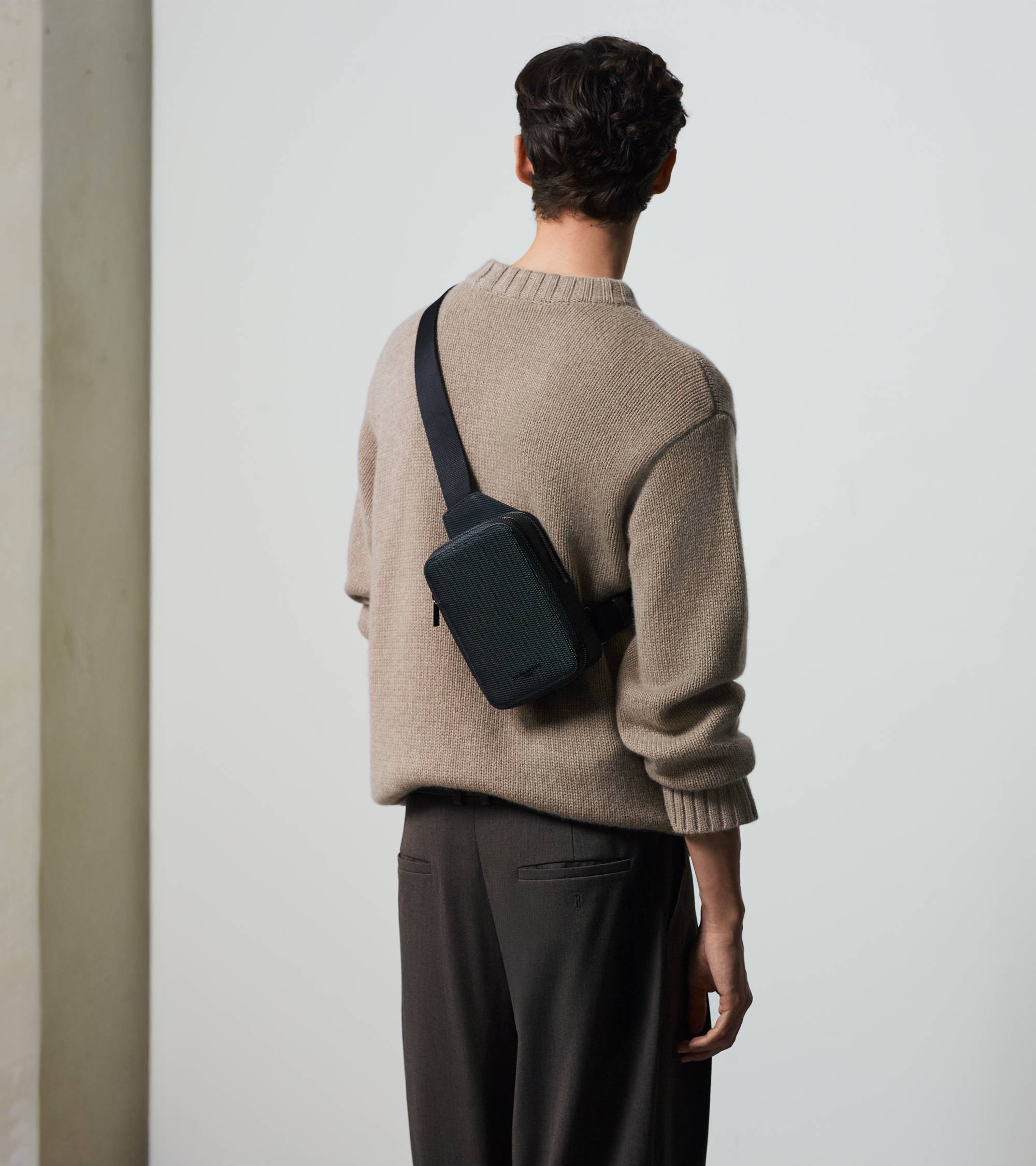 Emile sling bag in Signature T leather